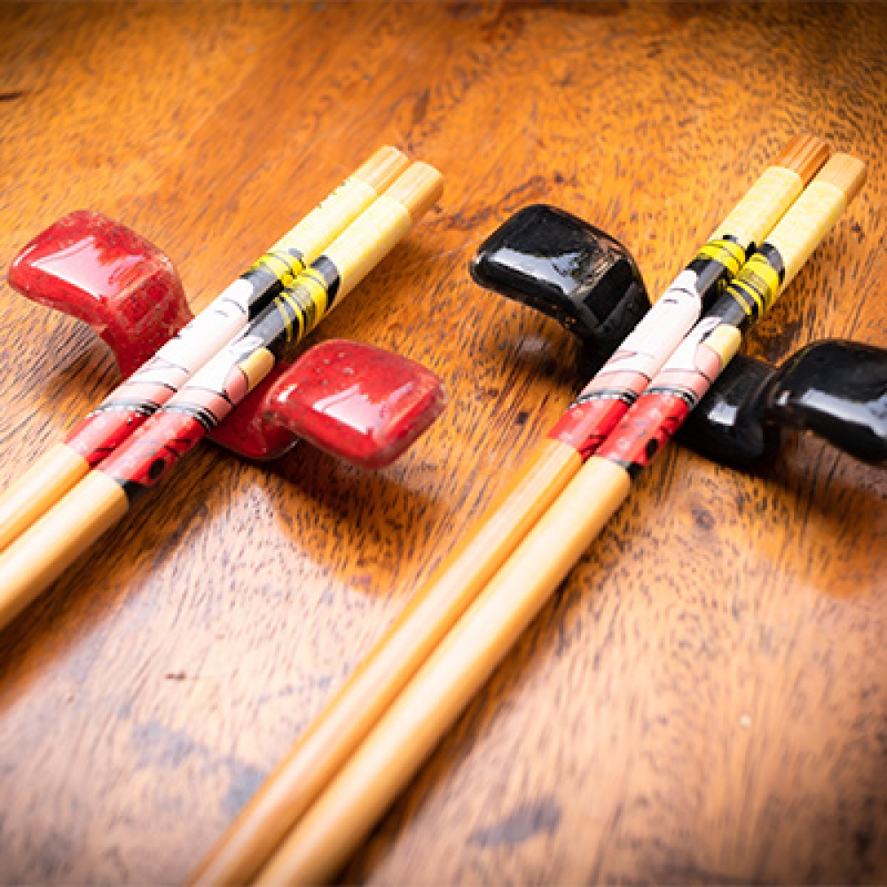 Apoya palitos rojo sushi