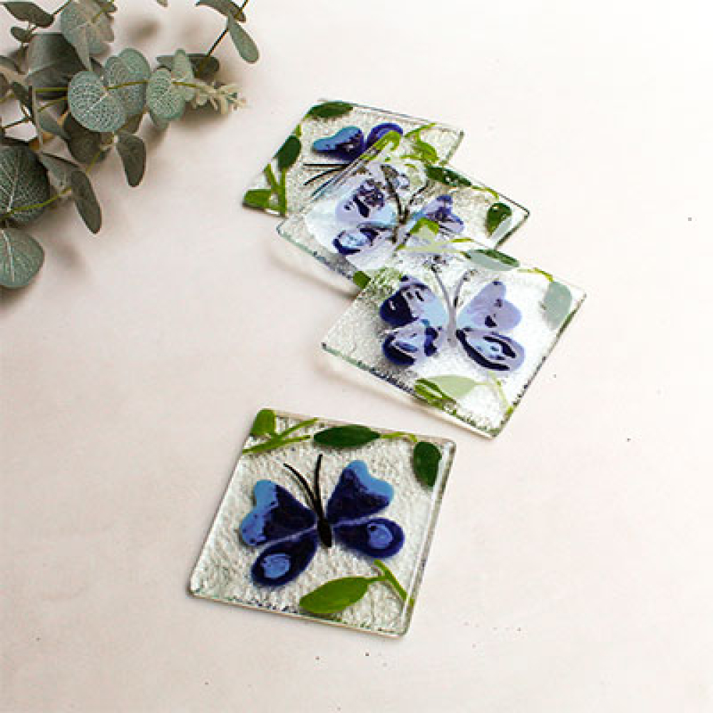 Posavasos mariposa azul